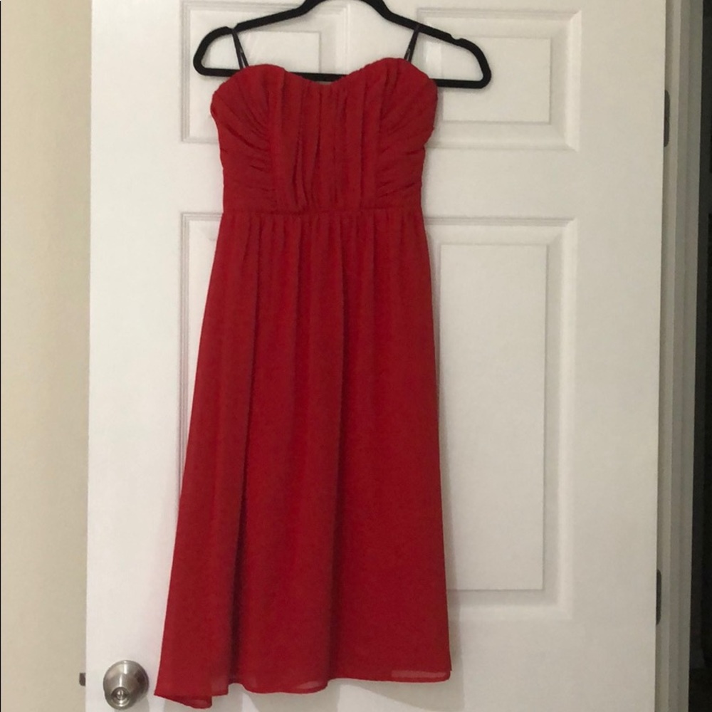 Red strapless tea length dress